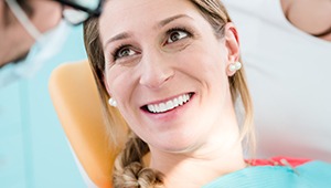 Relaxed woman smiling in dental chair